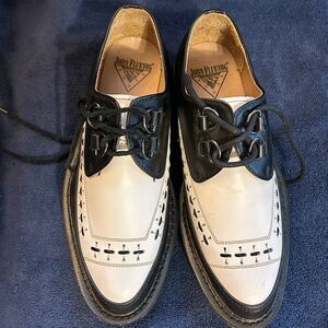 Amazing size 8 women’s black and white creepers.  Excellent condition